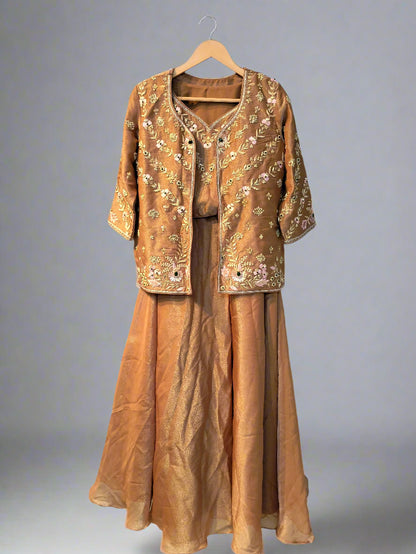 Brown embroidered outfit on a hanger against a plain background